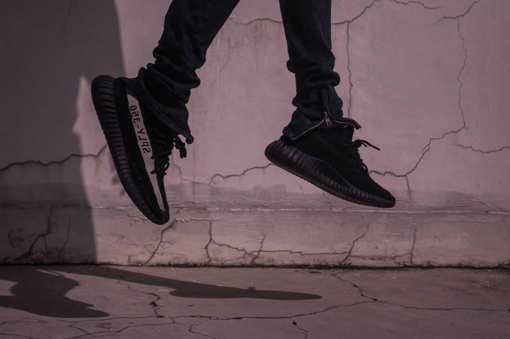 A man jumping with his Replica yeezy on