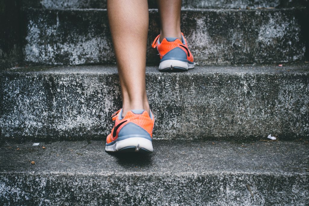 Walking on the stairs with replica sneakers