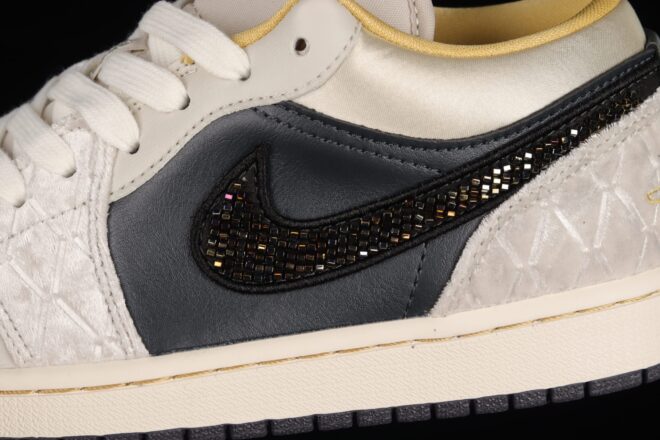 an iridescent beaded Swoosh